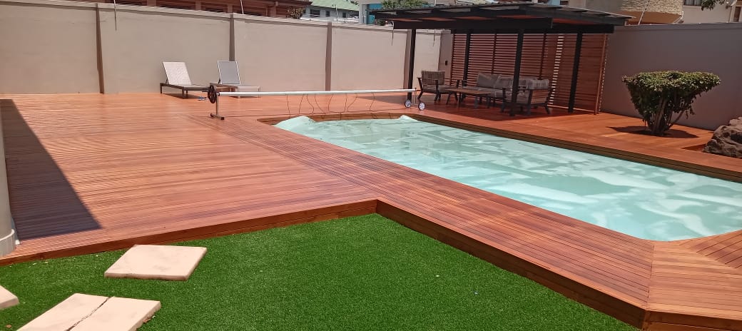 Custom wooden pool deck installation by FPS Woodworks in KZN