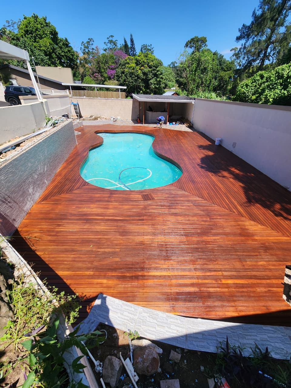 Completed curved pool deck with Balau timber finish